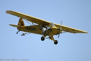 Stan Segalla with his classic yellow Piper always entertains the air show crowd.His 