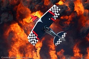 Skip Stewart's Pitts S2-S with Rich Gibson pyro in the background
