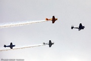UE08_029 Warbirds formation flyover over New York to mark VE Day. Beech D-18 leading the formation, three T-34A, two SNJ-5, T-28 Trojan and Navion
