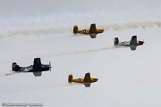 UE08_030 Warbirds formation flyover over New York to mark VE Day. Beech D-18 leading the formation, three T-34A, two SNJ-5, T-28 Trojan and Navion