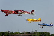 VG27_0170 RV airplanes taking off for large formation flight over Oshkosh grounds