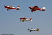 VG27_0175 RV airplanes taking off for large formation flight over Oshkosh grounds