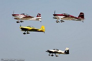 VG27_0183 RV airplanes taking off for large formation flight over Oshkosh grounds